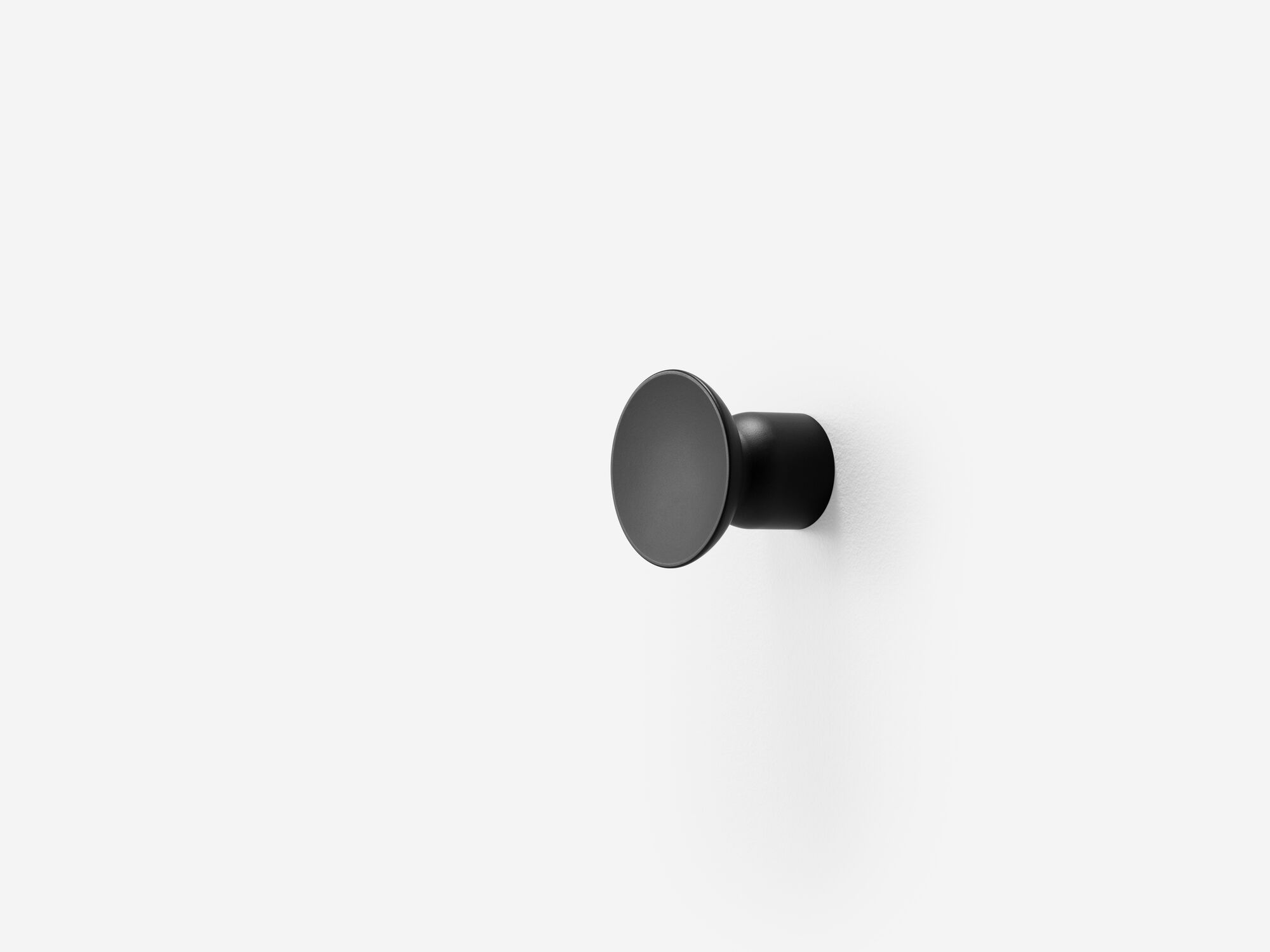 Medium black wall knob front angle view